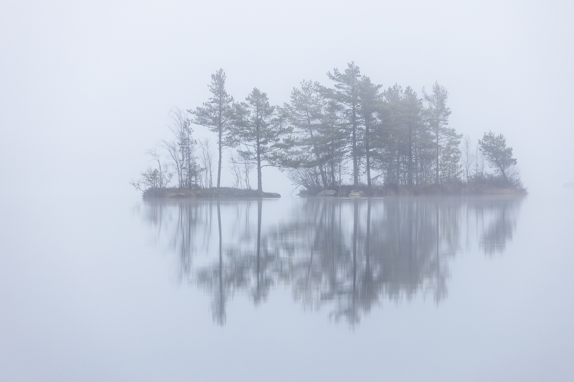 Winter landscape with frozen lake in Scandinavia