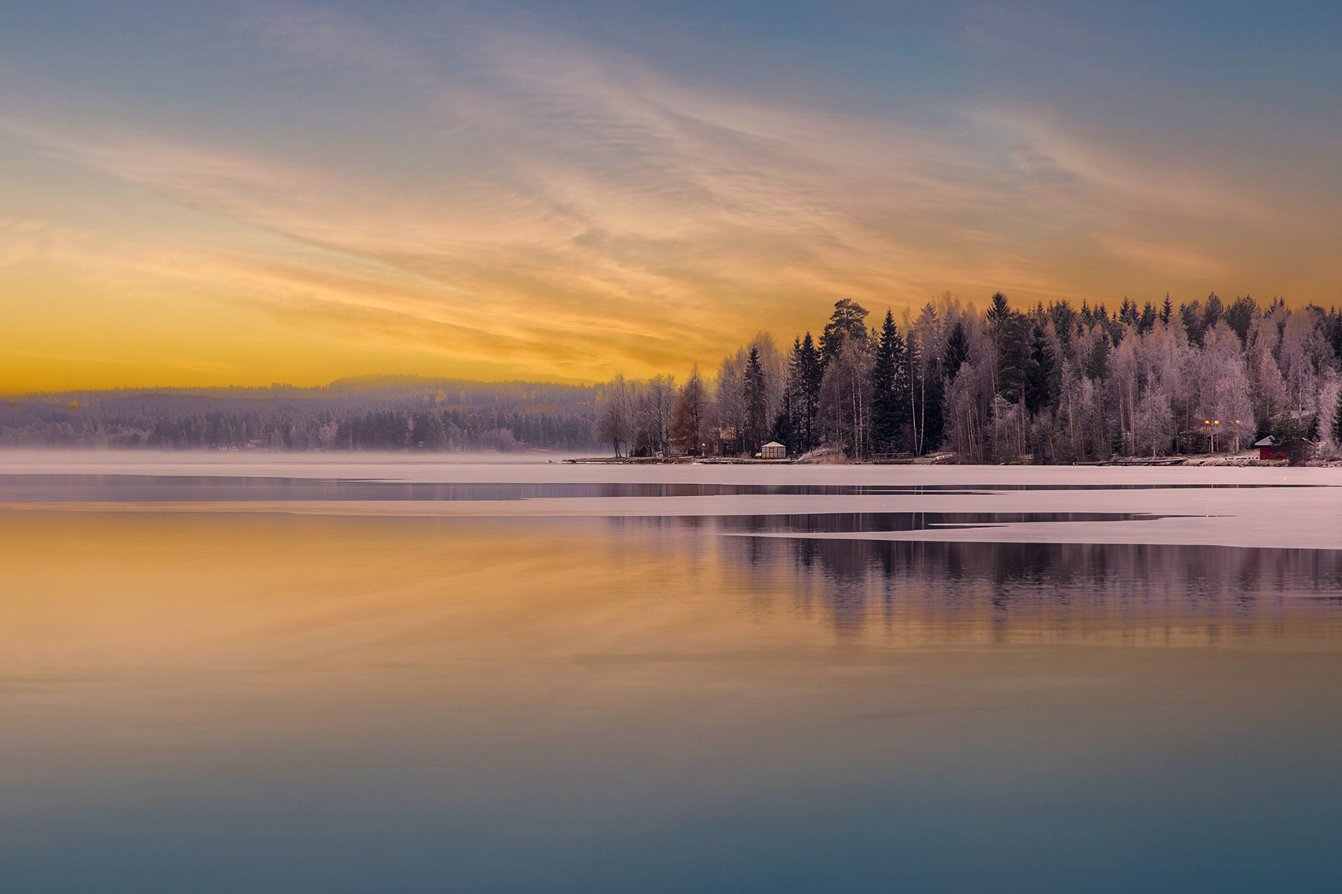 Soft sunset light over a calm lake