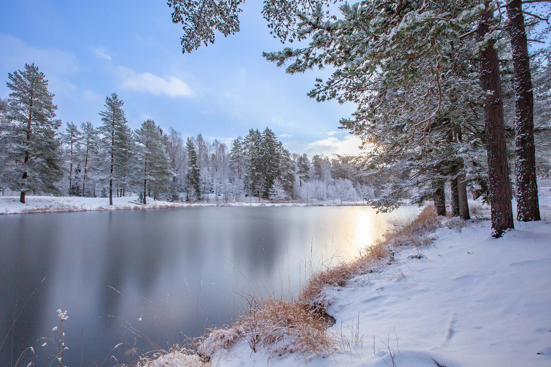 Frozen river in a Nordic winter scene