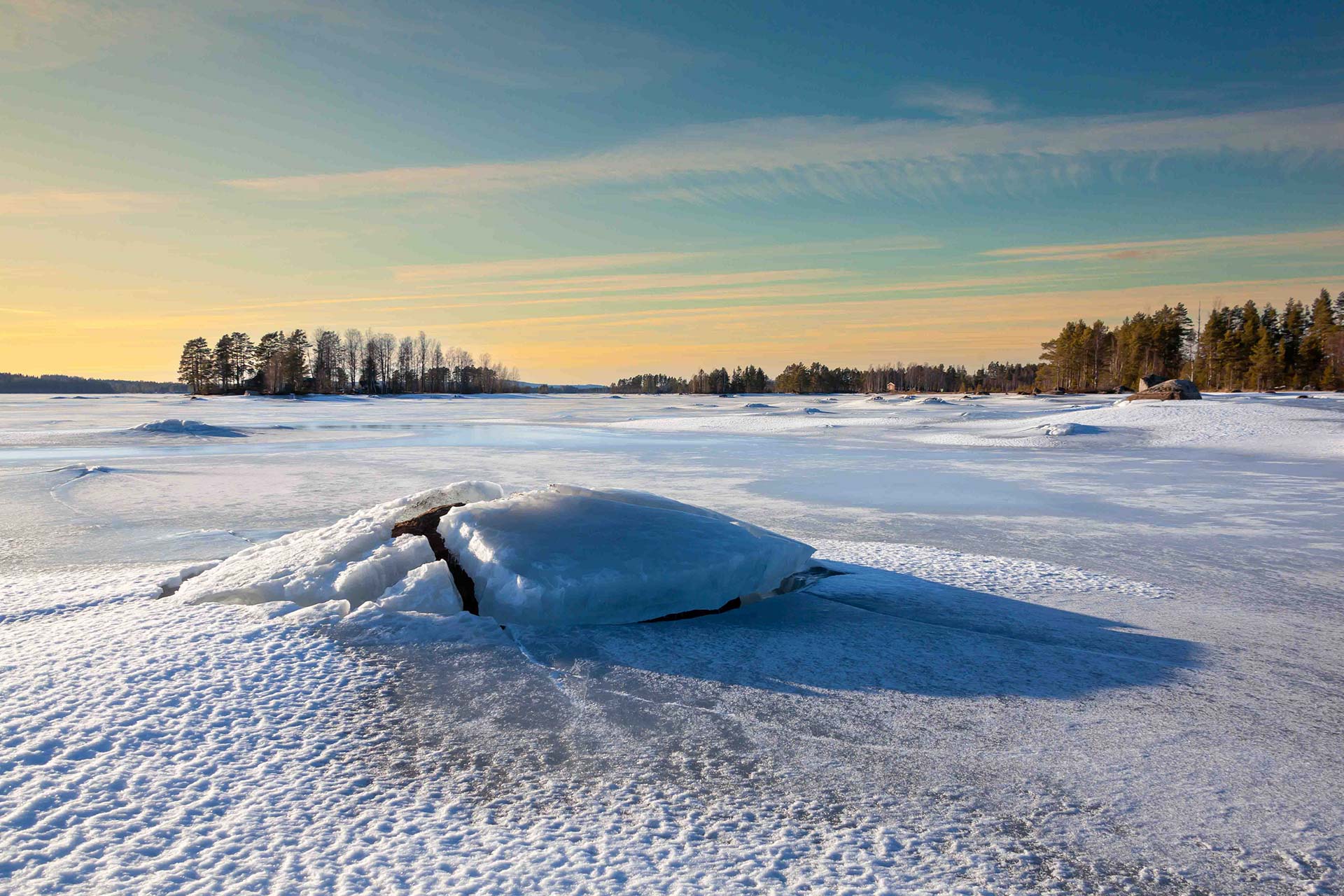 Snow-covered dunes in a Nordic landscape